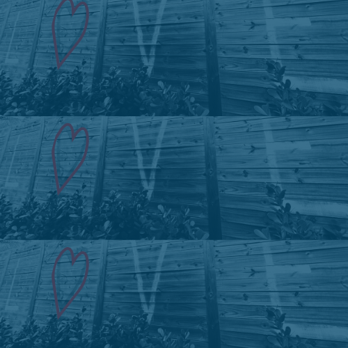 LOVE graffiti repeated on wall with a blue overlay